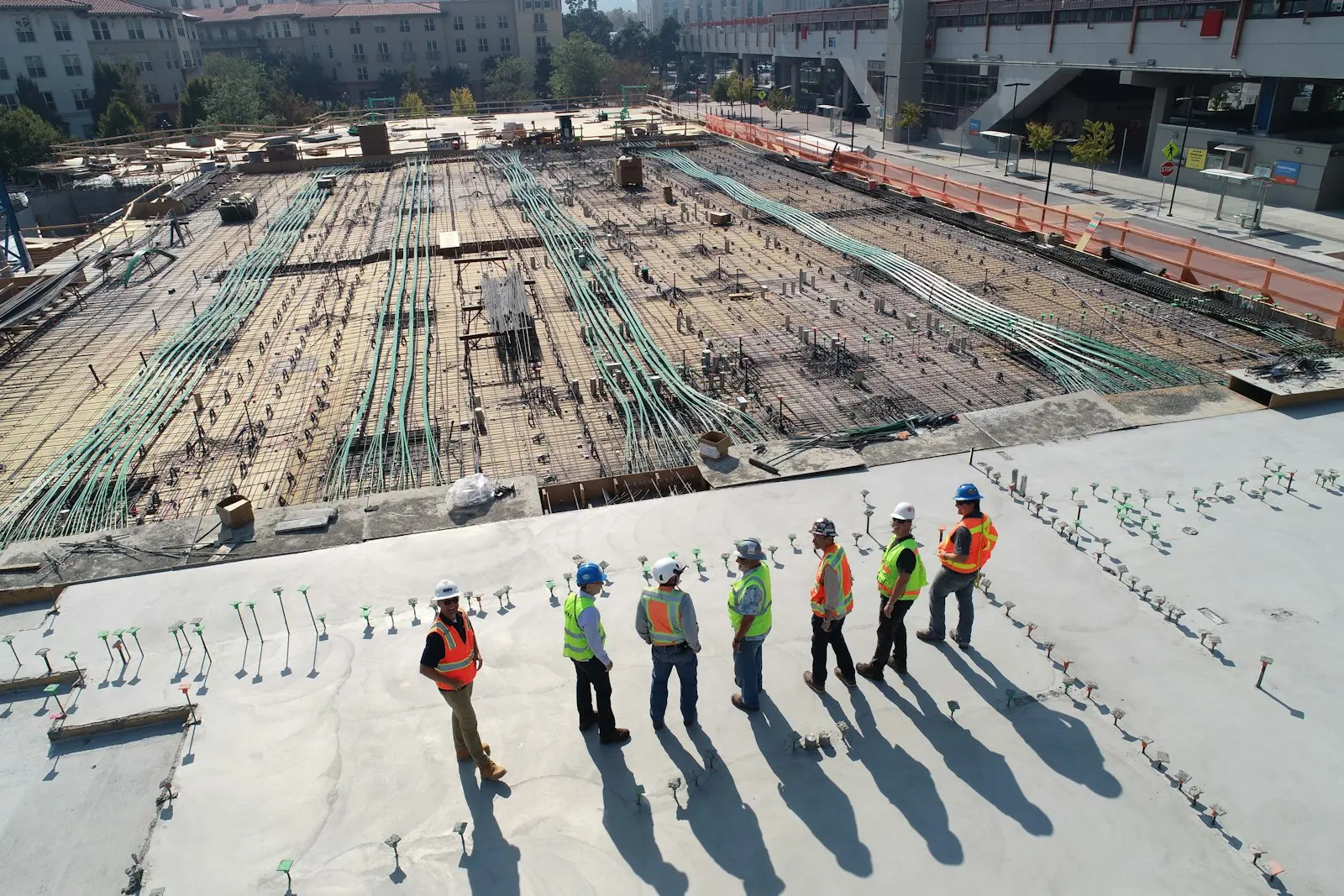 Contractor and owner walking a restaurant space to scope costs